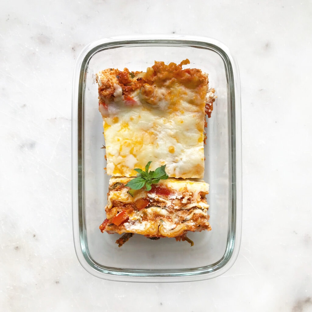 lasagna in a glass meal prep container
